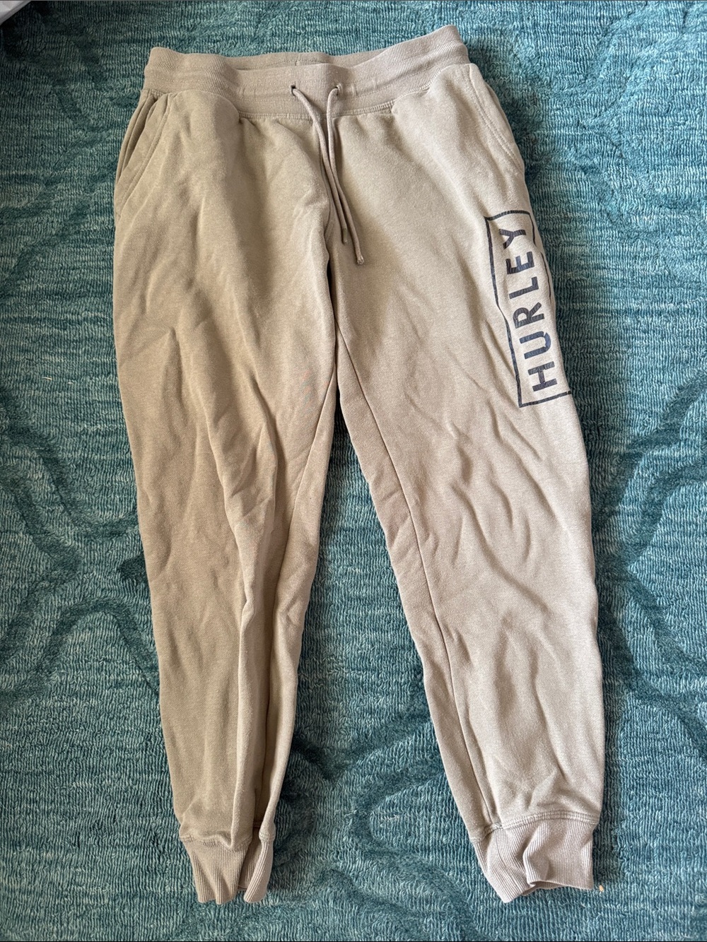 Hurley men’s /Tan Jogger Sweatpants with Logo says med. Fits more like a small
